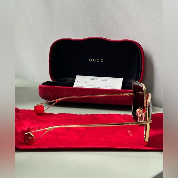 Gucci Sunglasses with Gold Details